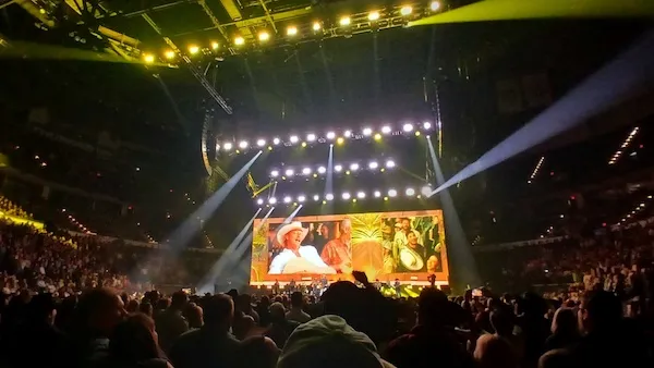 Last Call Tour — wide arena view, three-up screen content showing archival Alan Jackson photos